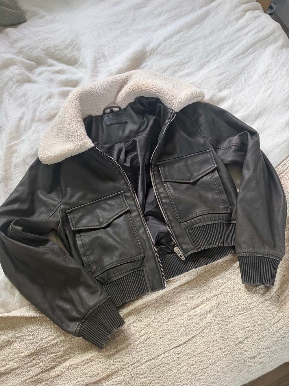 Blank NYC Black Leather Bomber Jacket with Cream Sherpa Collar
